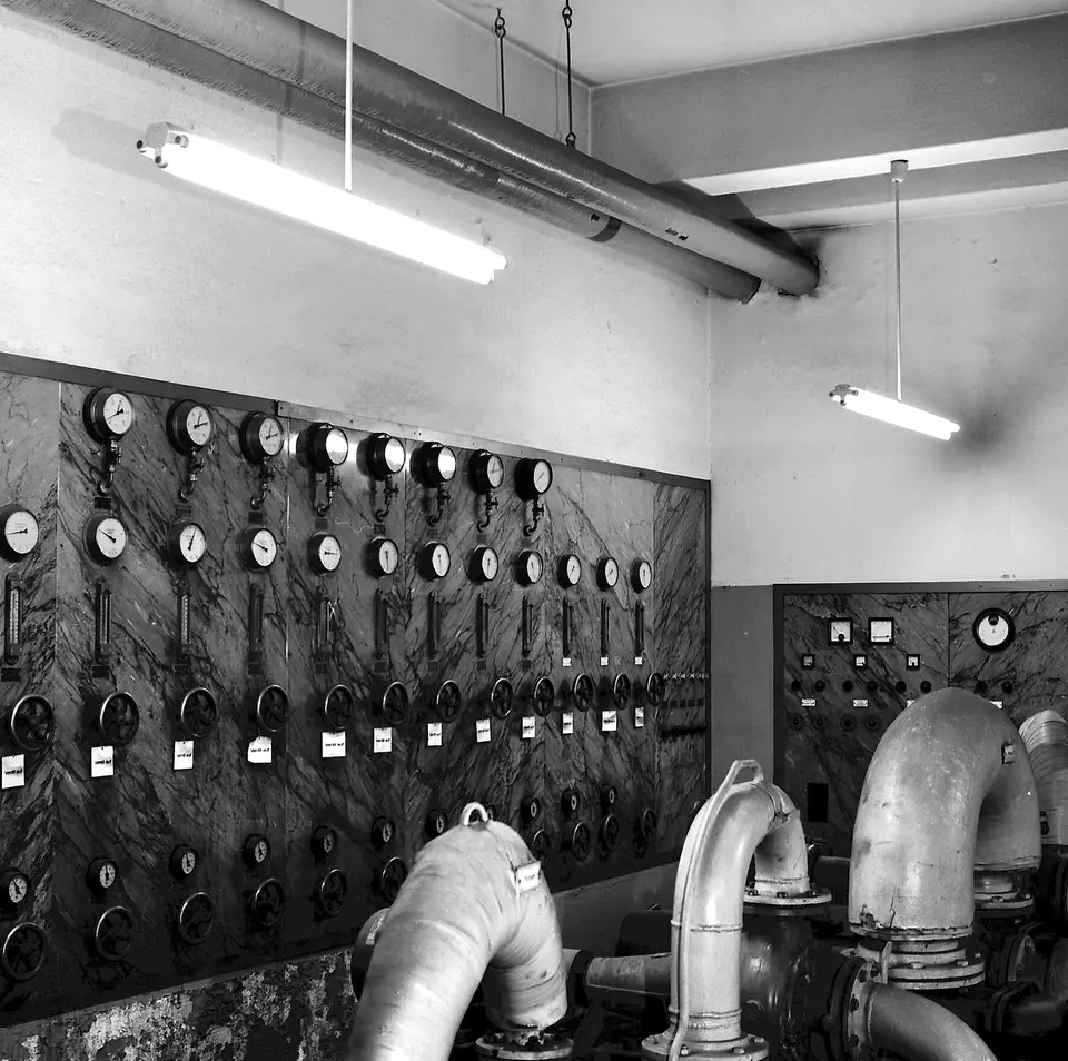 Mechanical room with boiler and heating pipes