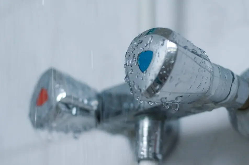 Chrome faucet with running water