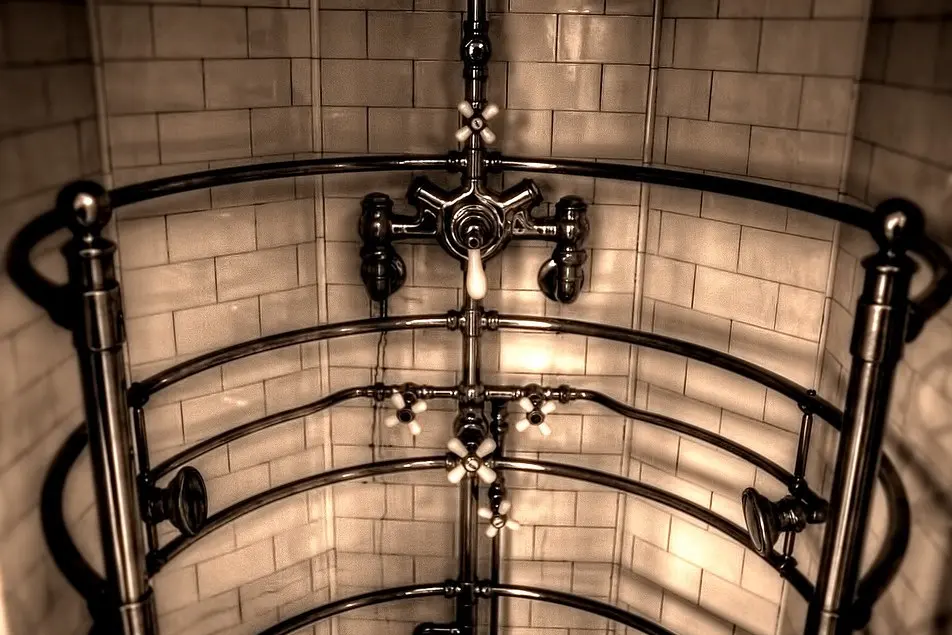 Metal water pipes along a building wall